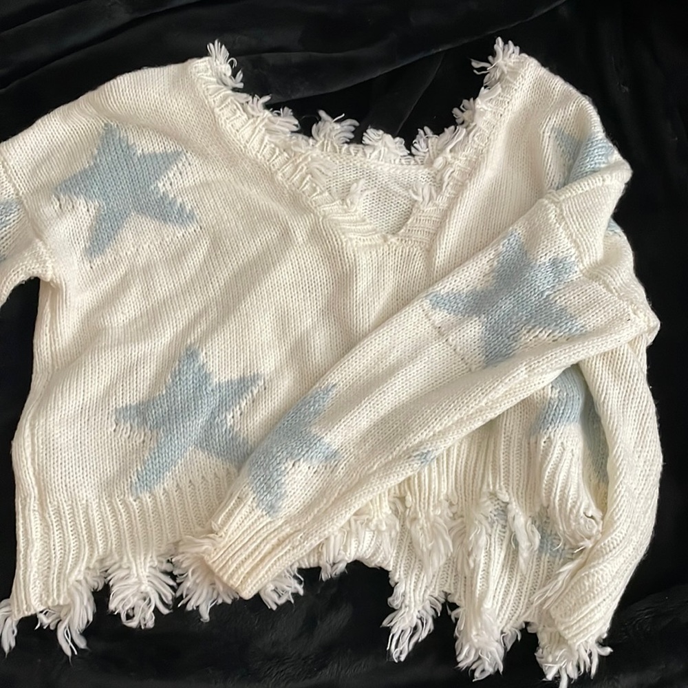Star off the shoulder sweater